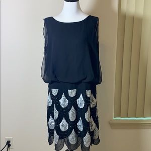 Black and white sequined party dress